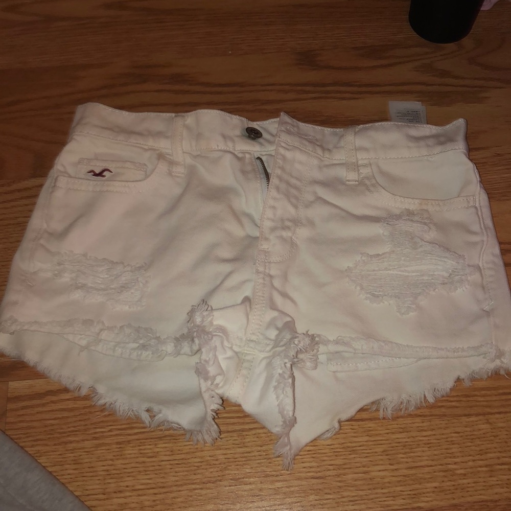 WHITE RIPPED DENIM SHORTS